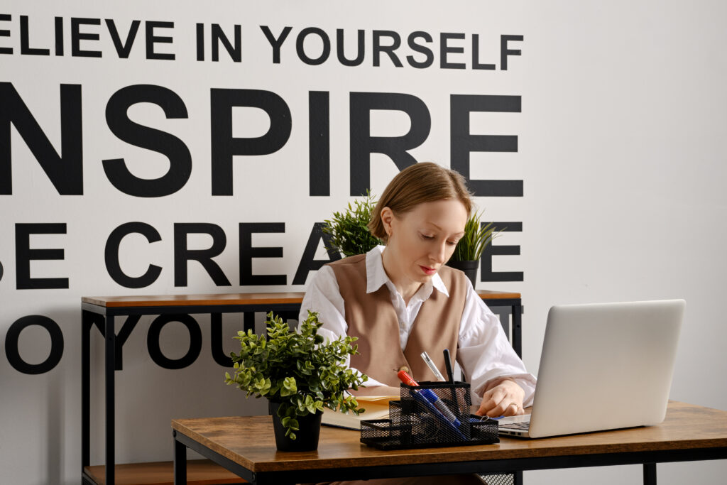 A woman writing her plan on how to get into sales